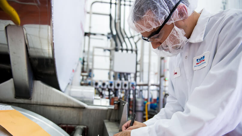 20140603_DFA_Fallon_plant_0449.jpg A DFA dairy manufacturing plant operator taking notes.